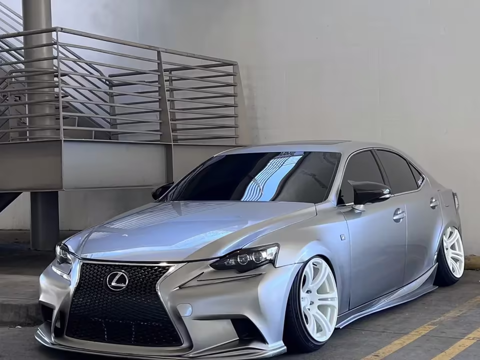 Silver Lexus IS with ceramic tinted windows in the install bay