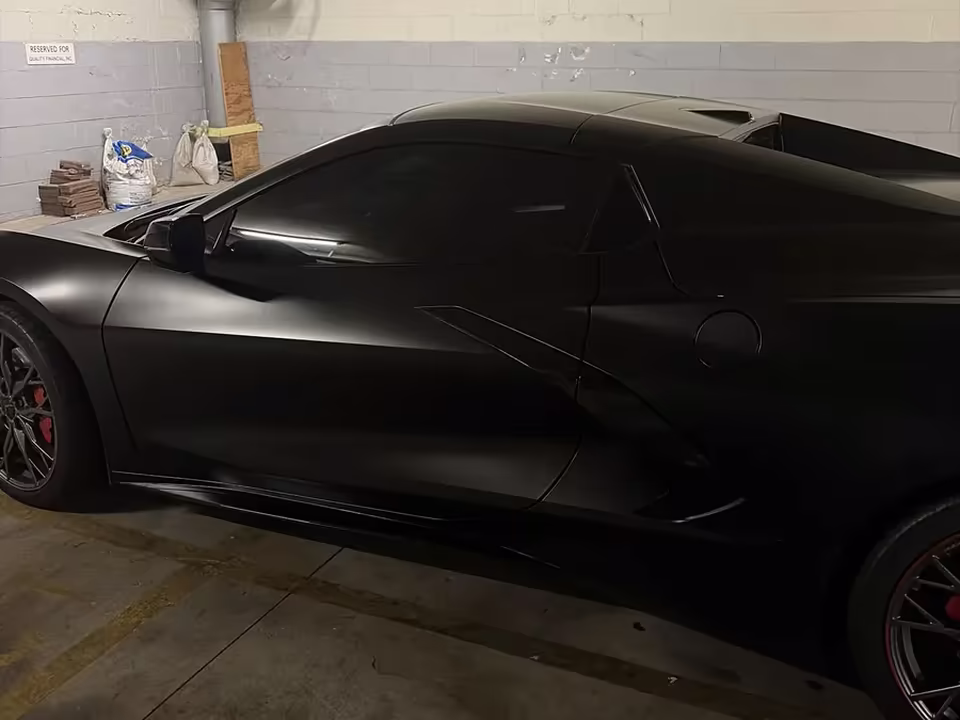 Sports car in the installation bay after a full ceramic tint install