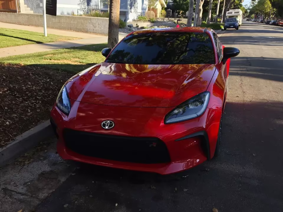Red Toyota GR86 with ceramic tinted front windows